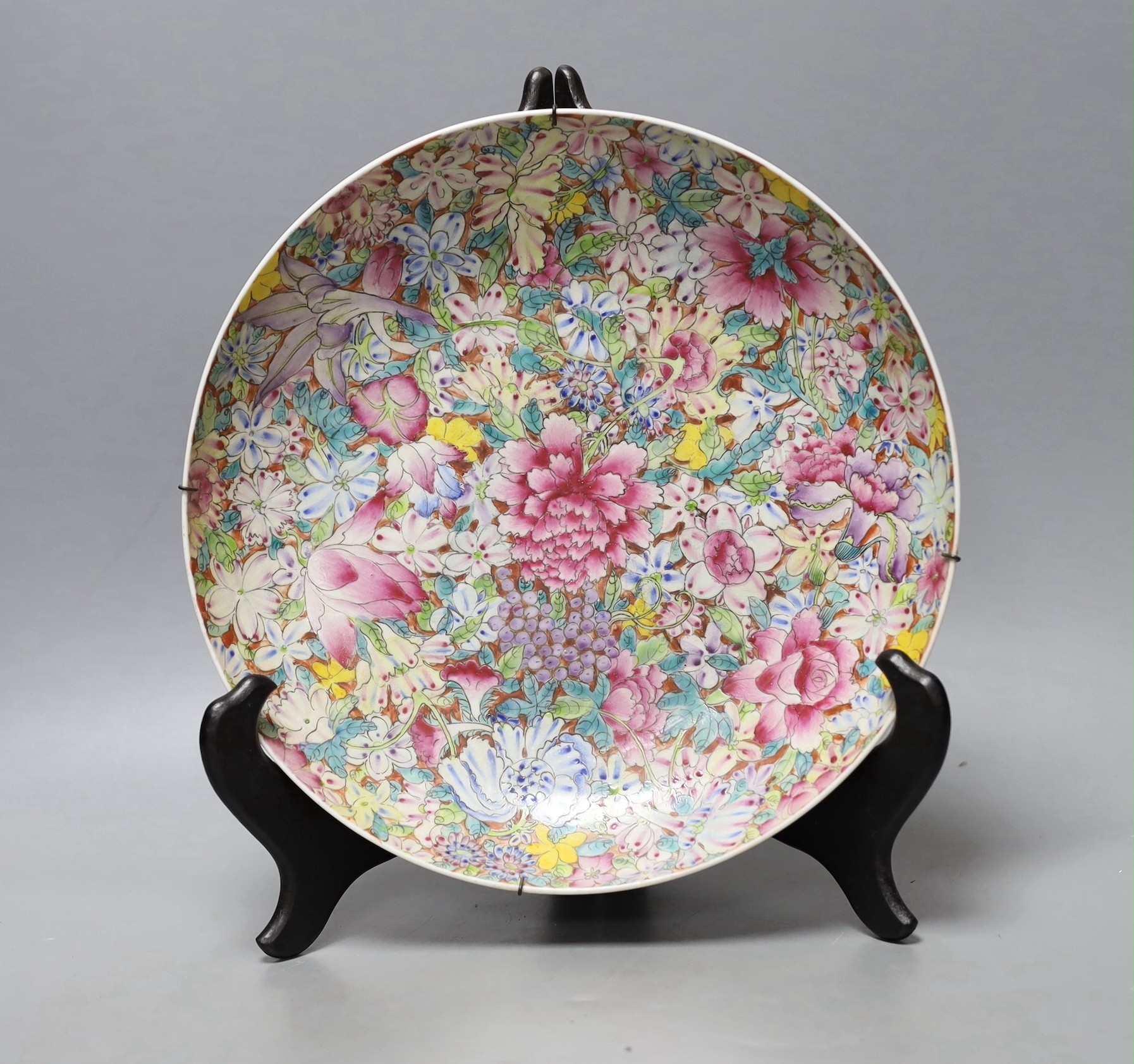 A Chinese famille rose millefleur dish, Guangxu mark but Republic period, 27cm diameter